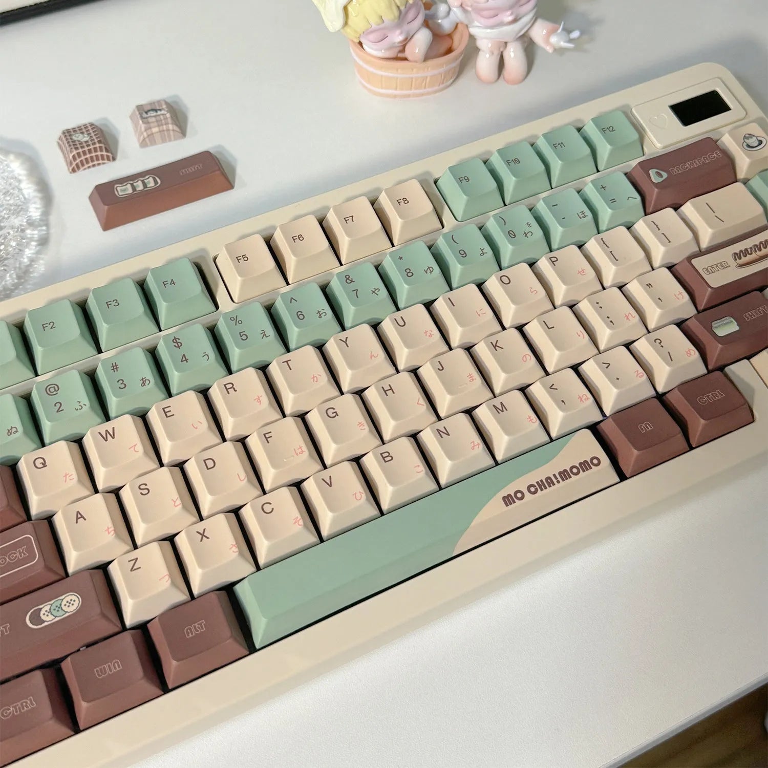 Matcha green theme mechanical keyboard keycaps with ergonomic CAP adaptive shafts on a white background.