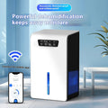 Milky white compact household dehumidifier with water reservoir tank on a bedroom floor.