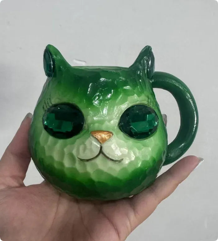 Resin cat cup gift with crystal Earth globe in blue, green, pink, or purple colour options.