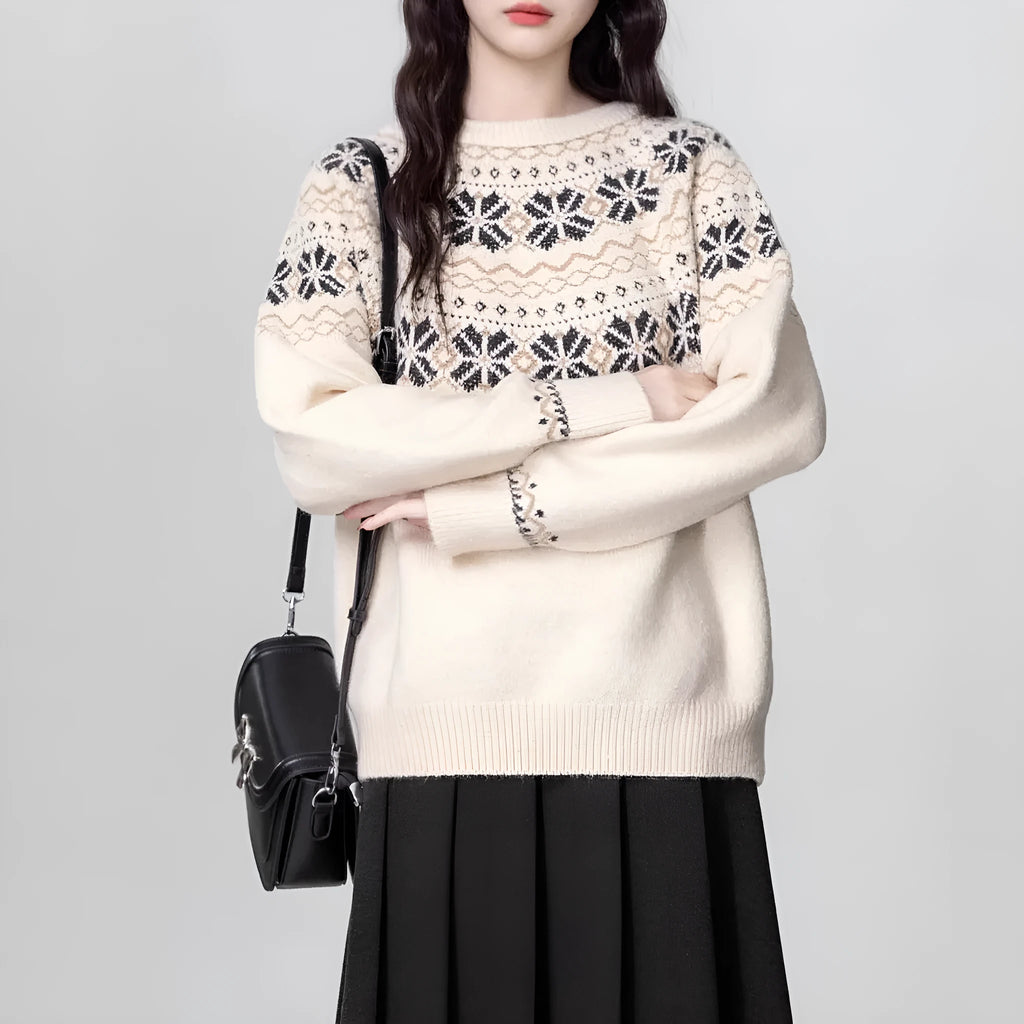 Women's milky white Fair Isle patterned knitted pullover sweater with a crew neck and long sleeves.