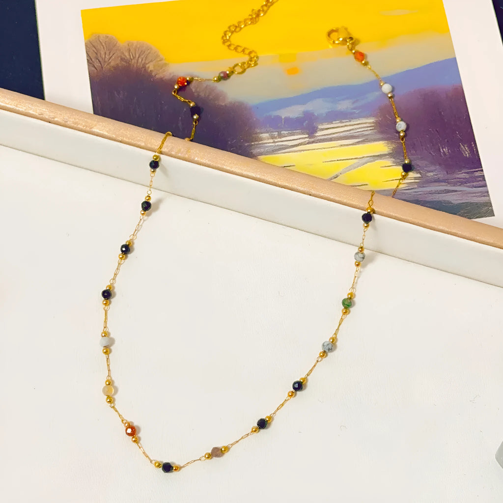 Women's titanium steel necklace with natural stone pendant and gold electroplated finish