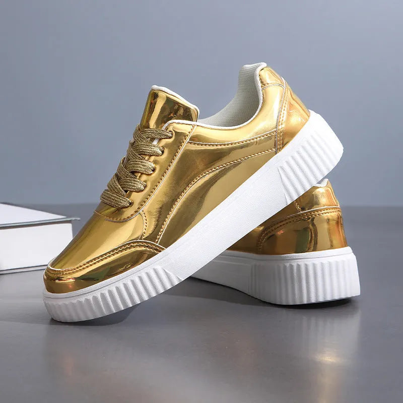 Sparkling gold sequinned platform sneakers with a round toe and thick MD sole.