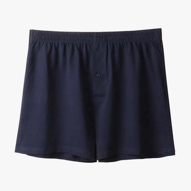 Men's high-waist loose fit cotton boxer shorts in black, shown flat.