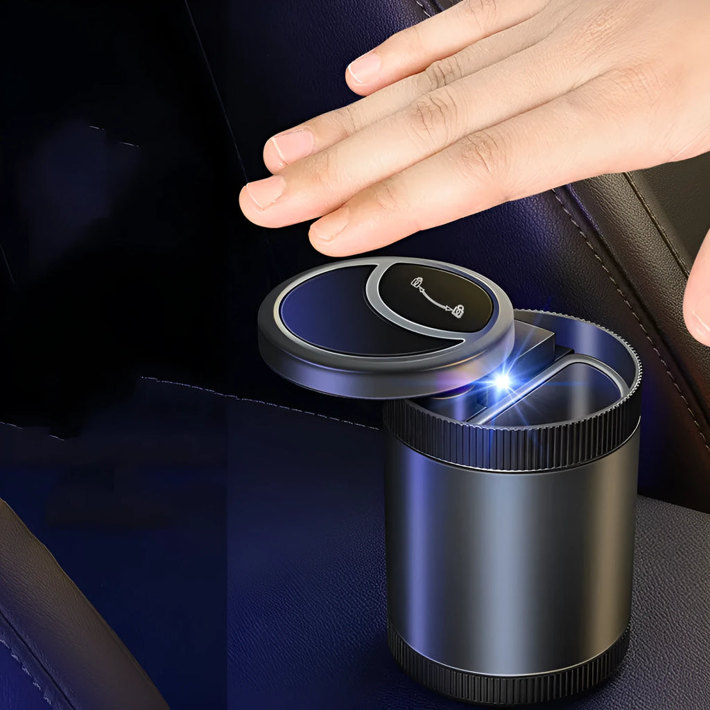 Automatic sensing vehicle ashtray in black, grey, red, or blue with USB cable.