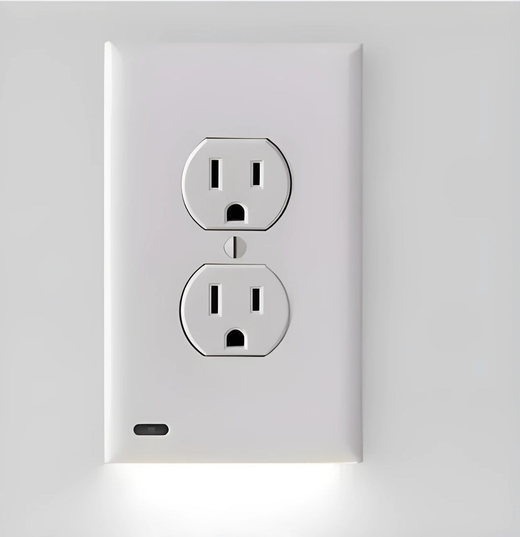 White socket induction LED night light plugged into a wall outlet.