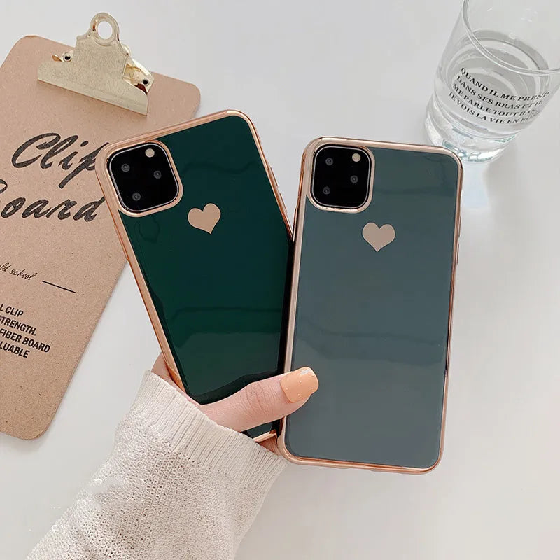 Solid colour TPU smartphone back cover case for iPhone models on a plain background.
