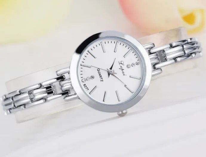 Women bracelet quartz wristwatch round dial silicone strap alloy case pin buckle silver rose gold