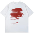 Plain white cotton loose fit t-shirt with short sleeves and a round neck.
