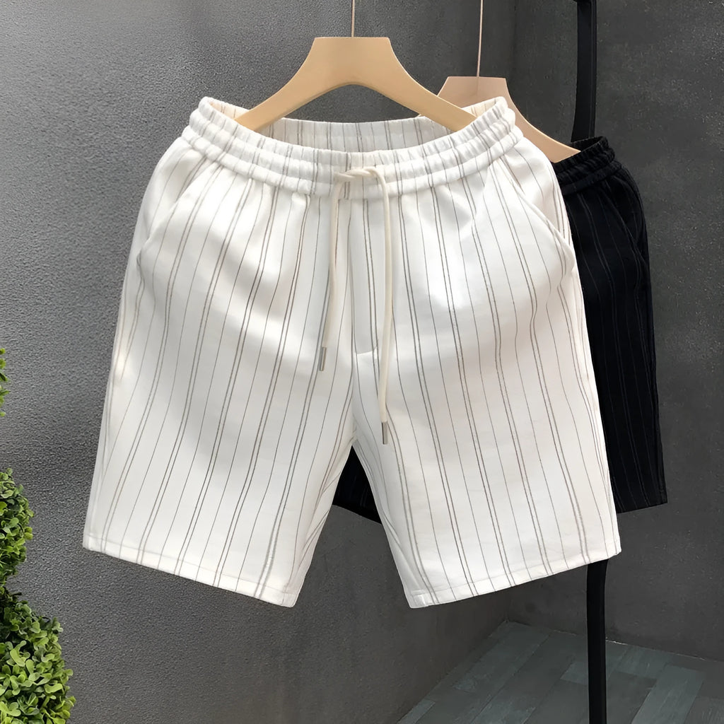 Men's black and white striped casual shorts with an ankle band and double-layer waistband.