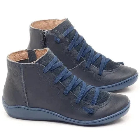 Women's black casual booties with wedge heel and round toe on rubber sole