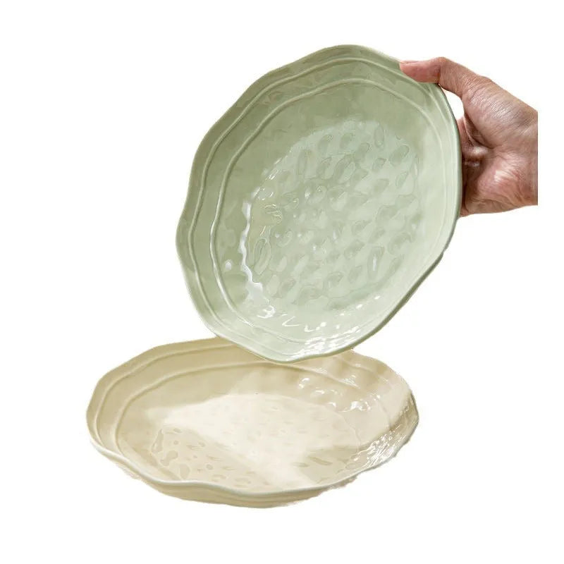 Solid colour ceramic tableware set with seven pieces showing modern simple design