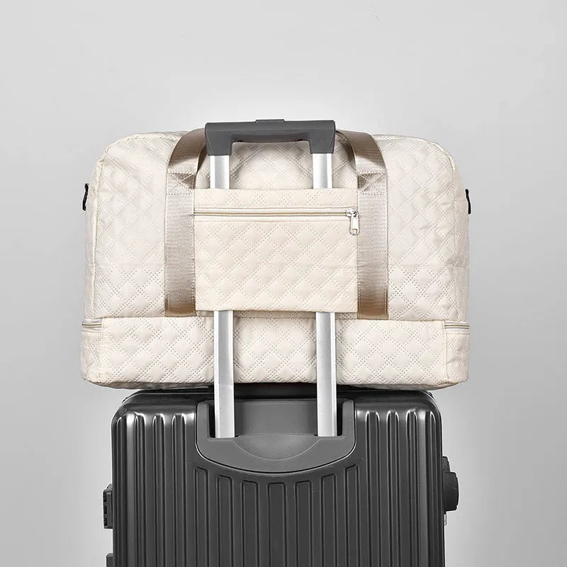 Large Oxford cloth leisure travel bag in a solid colour with a 36-55L capacity and breathable lining.