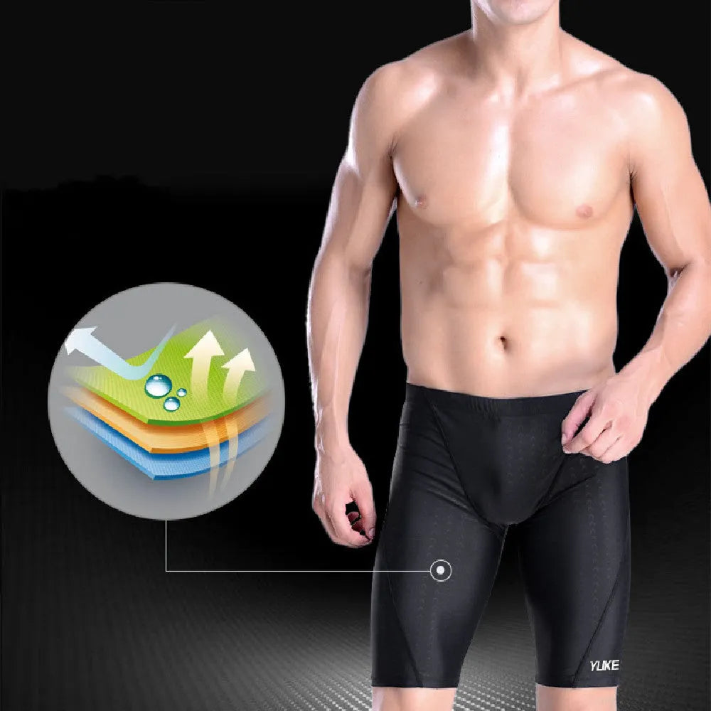 Men's black polyester swimming set with trunks, anti-fog goggles, cap, ear plugs, nose clip, and carrying bag