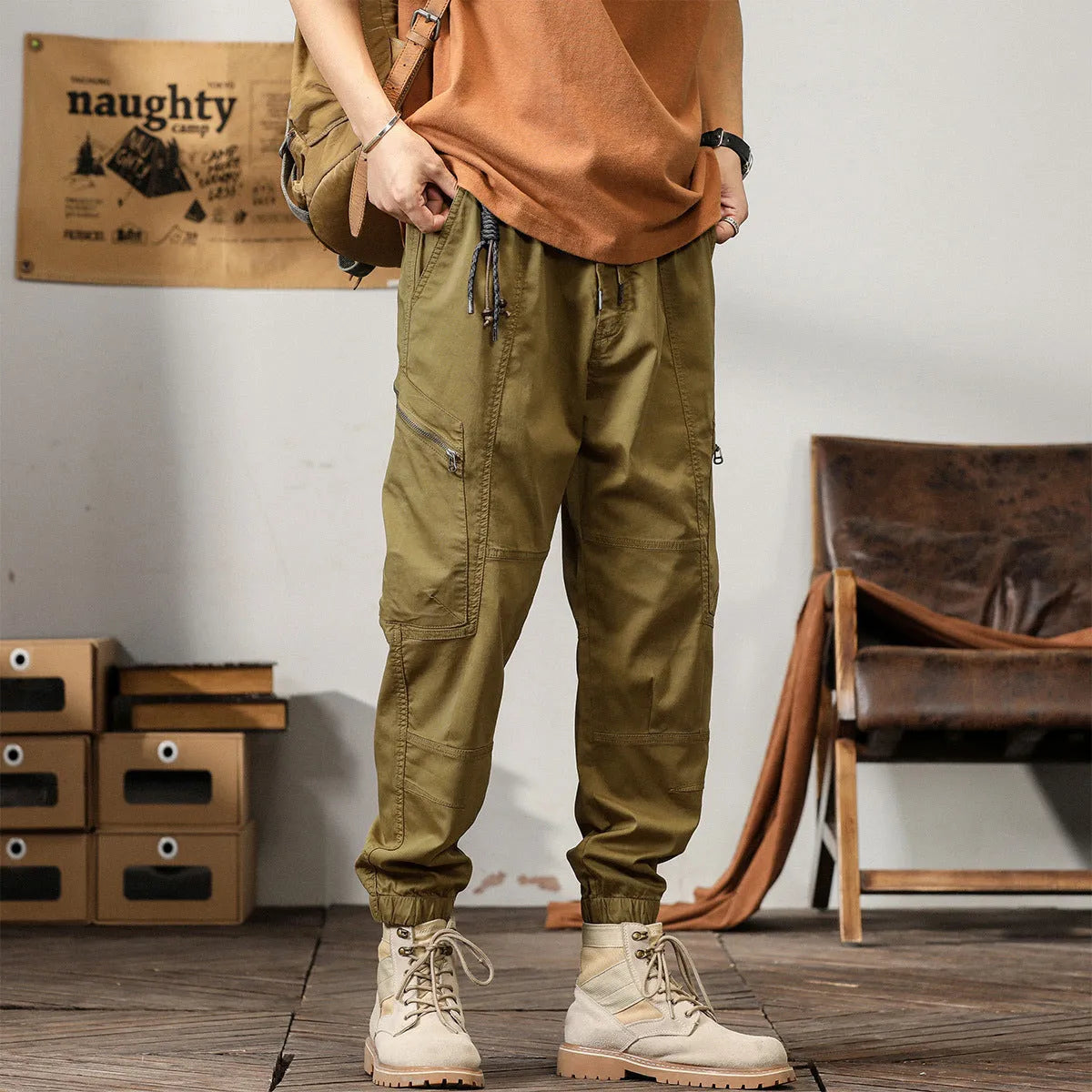 Men's khaki coloured loose fit cotton harem pants with a tapered ankle band.