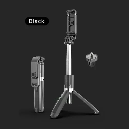 Black extendable Bluetooth selfie stick tripod with wireless remote next to a smartphone