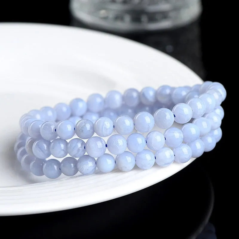 Blue agate bracelet with natural striped beads and scattered Ruyi charm elements