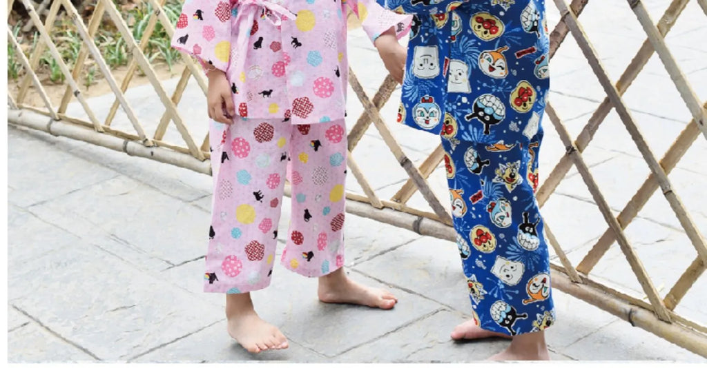 Pink cotton girls pajama set with long sleeves and floral ball cat cartoon print