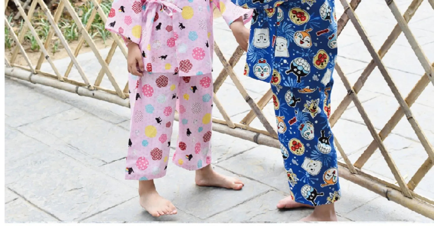 Pink cotton girls pajama set with long sleeves and floral ball cat cartoon print