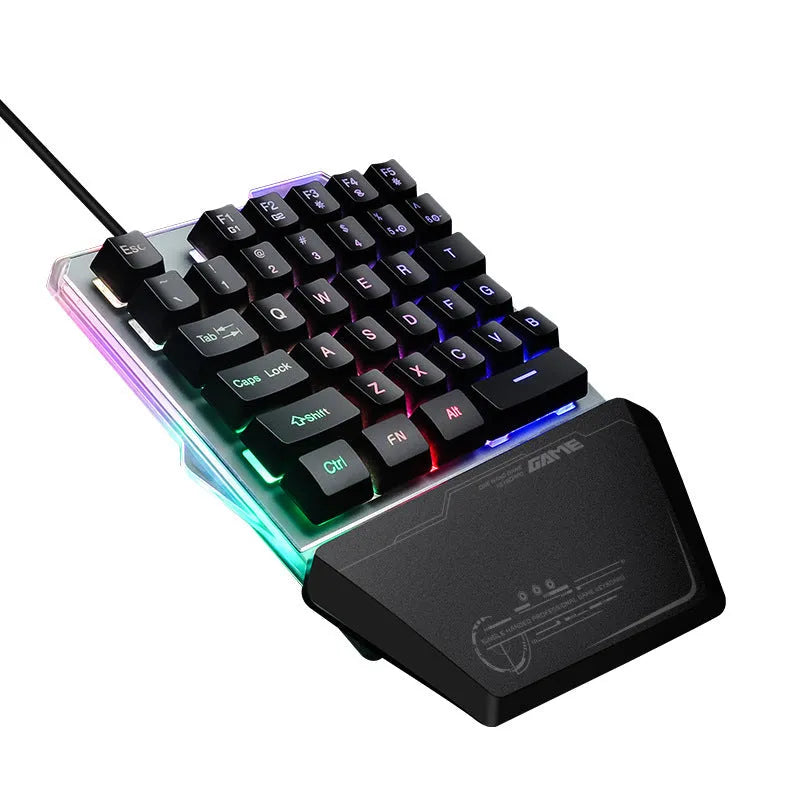 G40 black one-handed mechanical keyboard with RGB backlit keys on a desk.