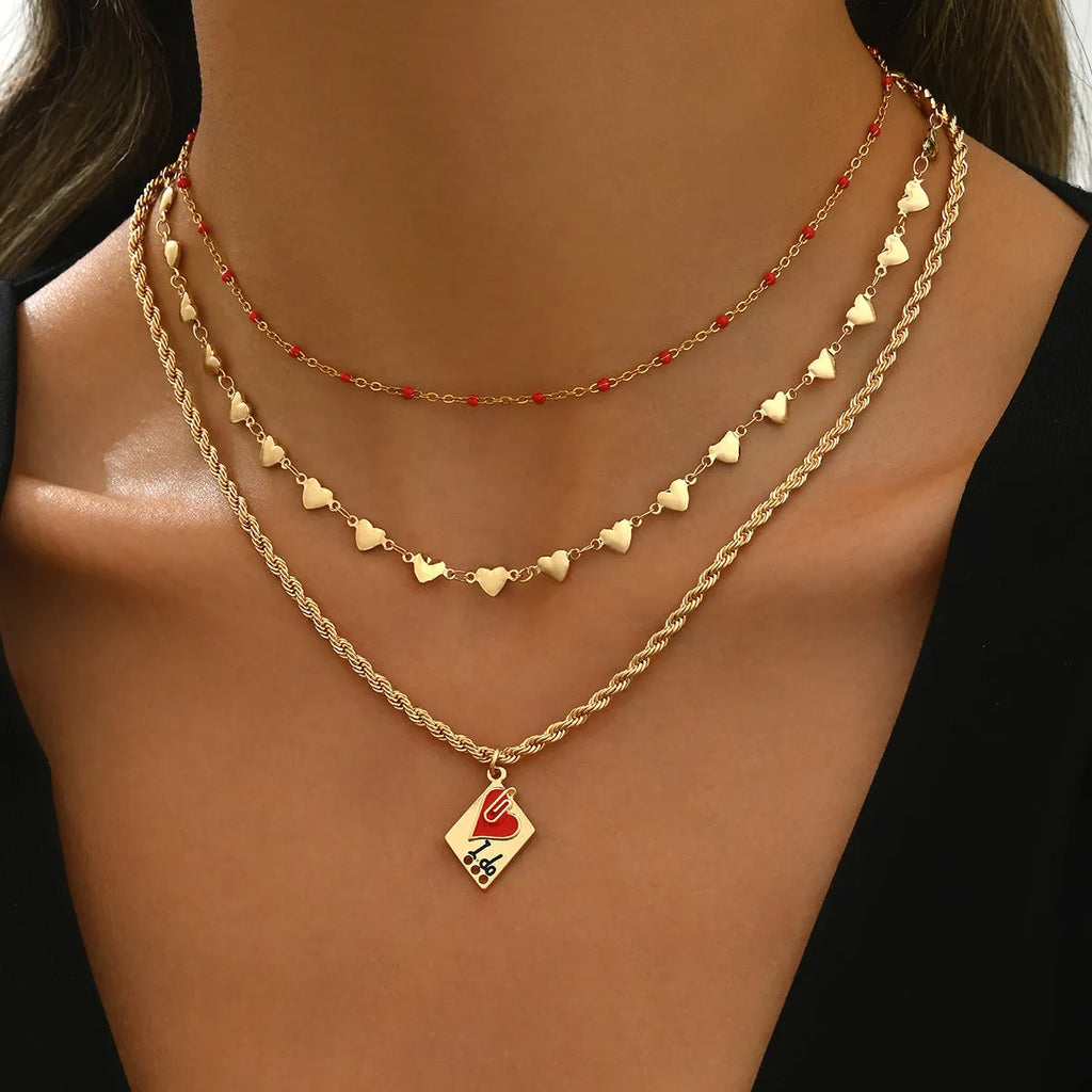 Zinc alloy geometric heart pendant on three-layer adjustable clavicle chain necklace