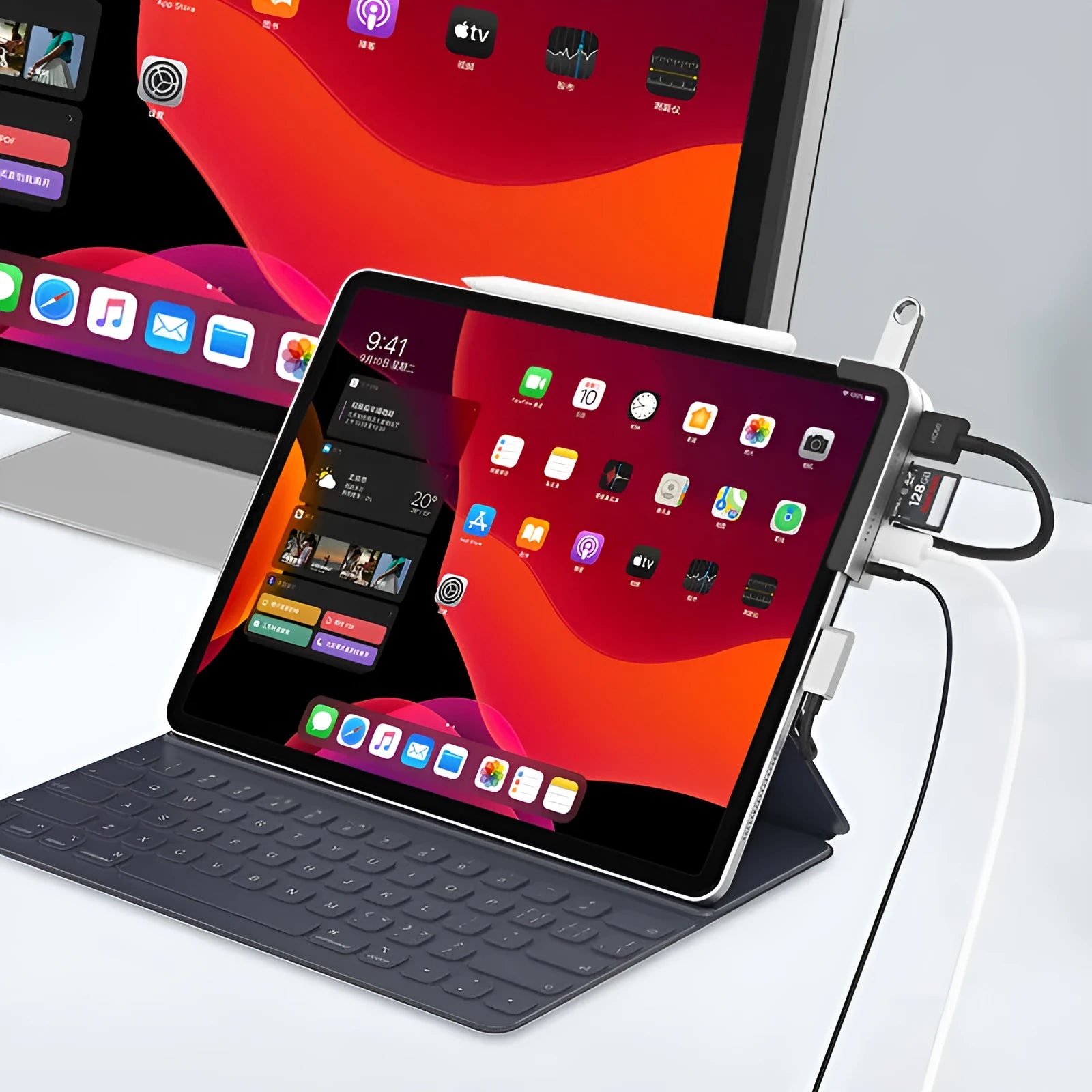 Silver aluminium grey USB-C docking station and multi-port converter for iPad Pro models.