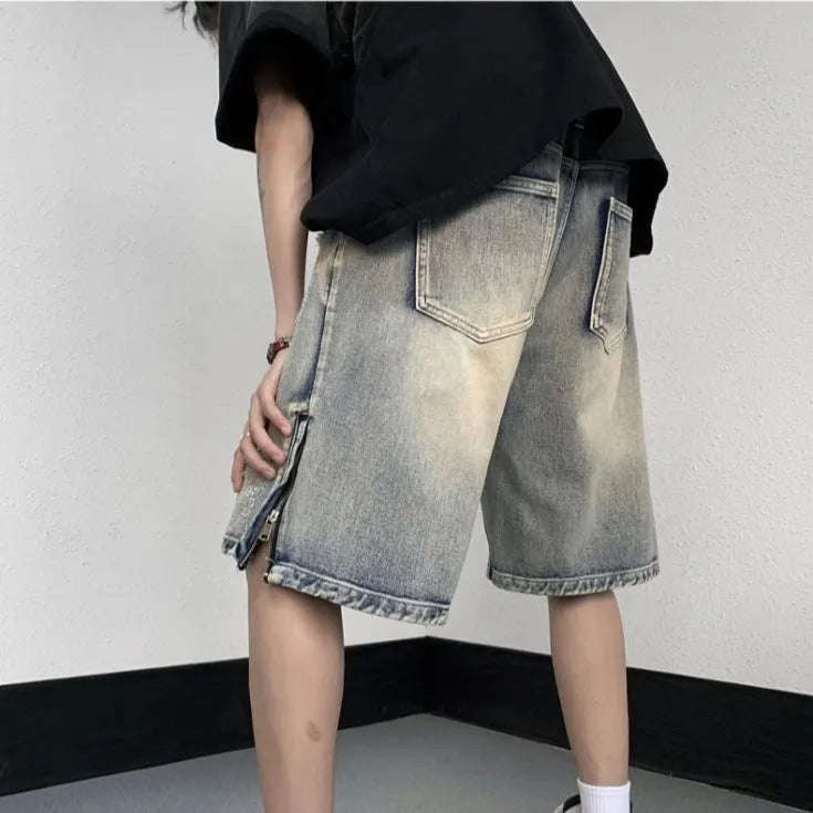 Blue retro-style women's denim shorts with a wide-leg loose fit and tattered detailing.