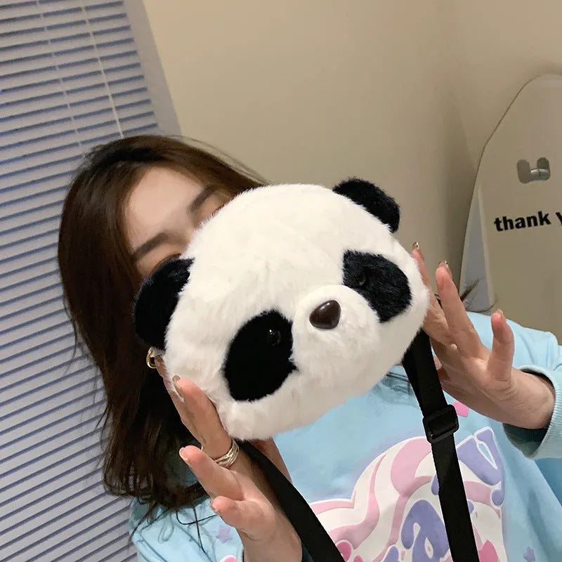 Soft plush cylindrical crossbody bag with panda head print, showing sandwich pocket