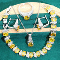 Bridal jewellery set with zircon accents showing necklace, earrings, ring, and bracelet in alloy construction