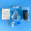 Transparent CPAP breathing mask with silicone seal, headgear, and two polycarbonate adapter elbows for ventilator connection.