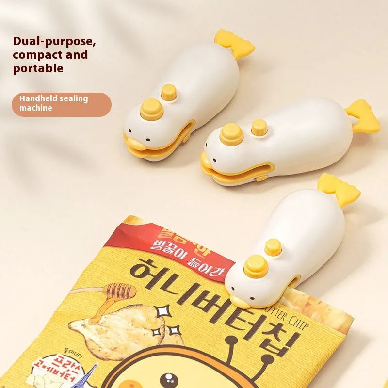 Yellow duck-shaped rechargeable sealing machine with animal jacquard pattern and charging cable