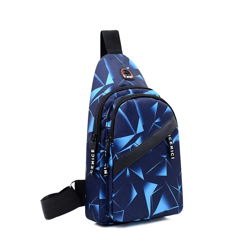 Men's blue print sling chest bag with earphone hole, shown worn crossbody.