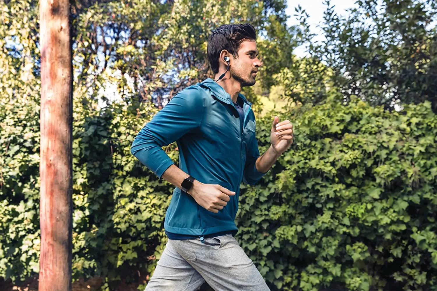 Black smartwatch with heart rate monitoring and sleep tracking on wrist