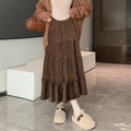 Korean style corduroy A-line midi skirt with elastic waistband in solid colour on hanger.