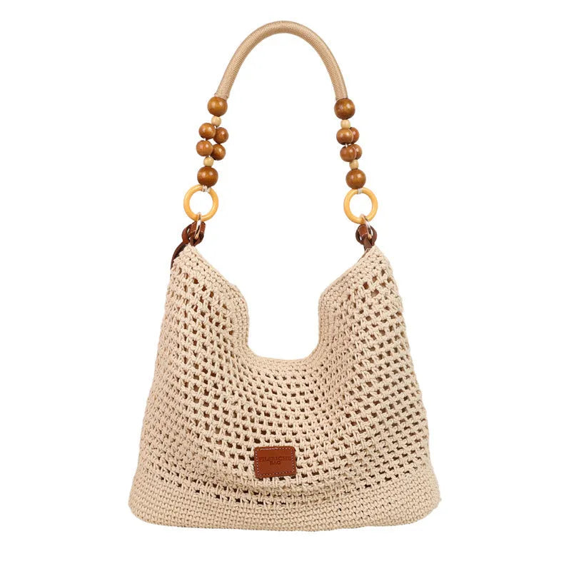 Knitted bucket tote beach bag with contrast stitching and zippered interior compartment