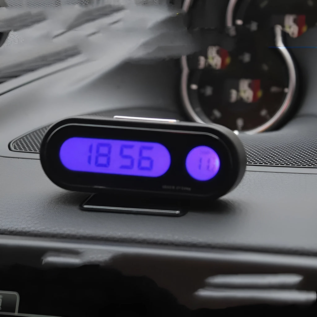 Black electronic car dashboard clock and thermometer unit with digital LED display on an adjustable bracket.