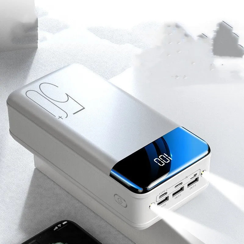 Large black 50000mAh power bank with three USB output ports showing dimensions 169x83x52mm
