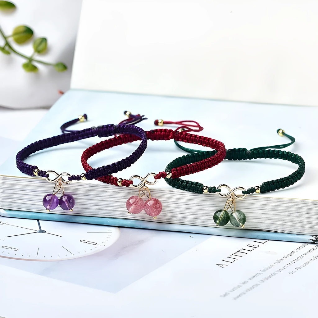 Natural strawberry quartz cherry bracelet for women on adjustable elastic cord, showing fruit-shaped crystal design.