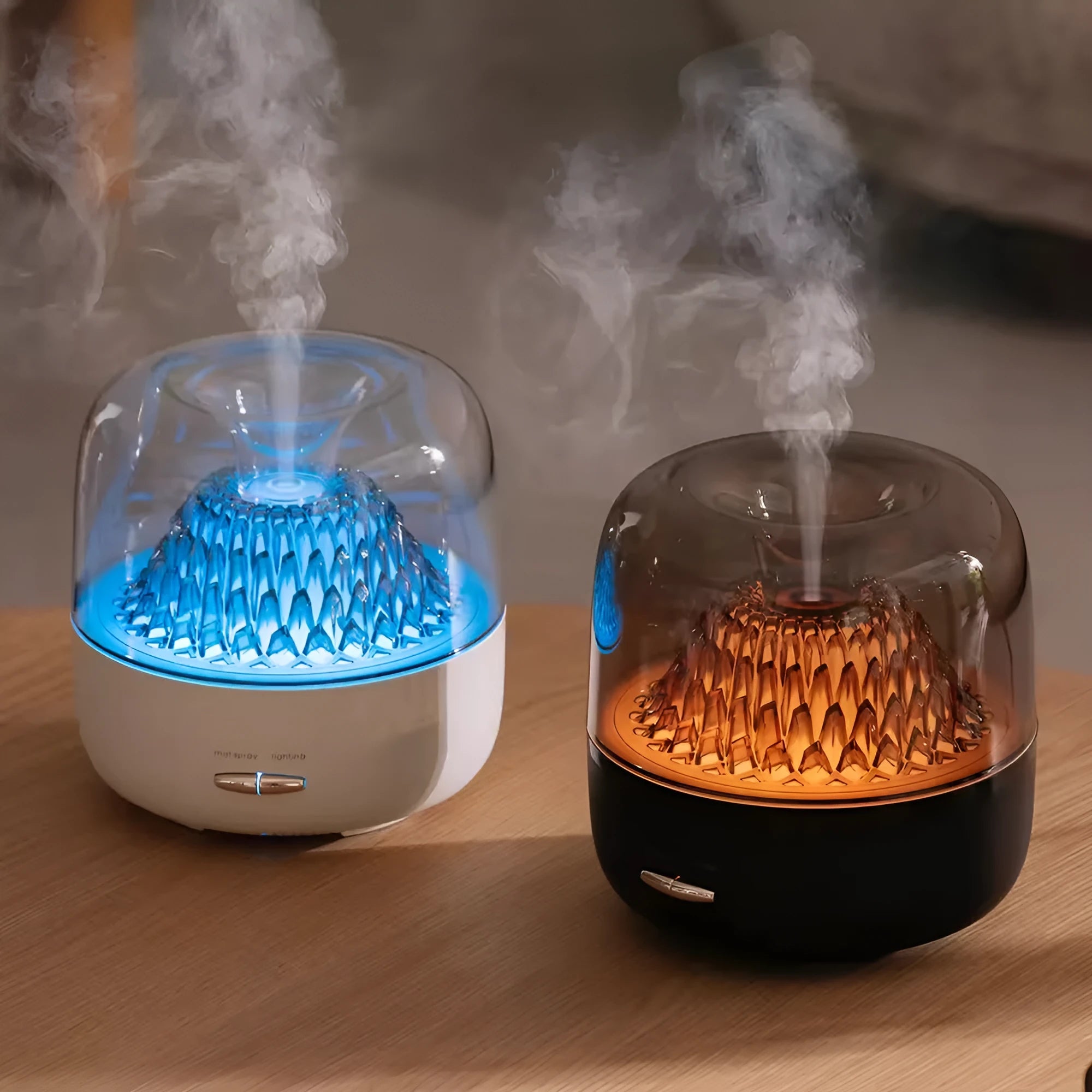 Round resin aroma diffuser in beige on a desk, with mist rising from single outlet, plug-in cord visible