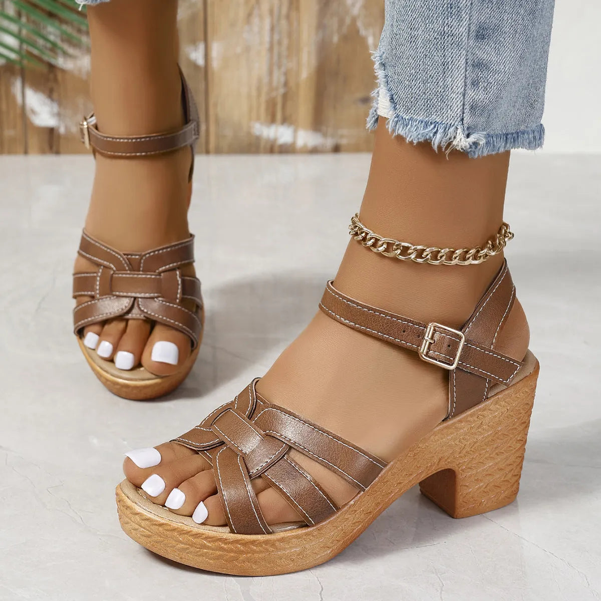Plus size black peep toe women's sandals with a chunky heel and ankle buckle strap.