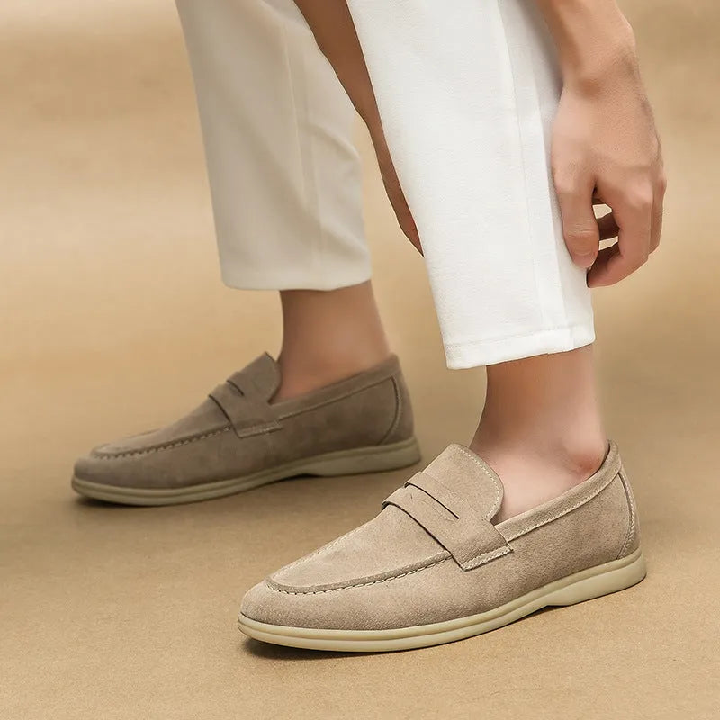 Men's slip-on leather casual shoes in black with round toe and rubber sole