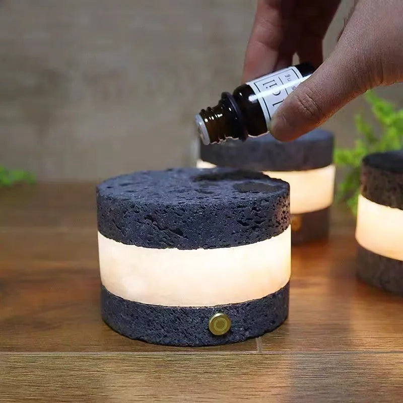 Orange volcanic rock USB night lamp with touch dimming and essential oil well, measuring 9cm by 7.5cm.