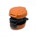 Bright red breakfast machine sandwich maker with egg cooker ring and mechanical controls