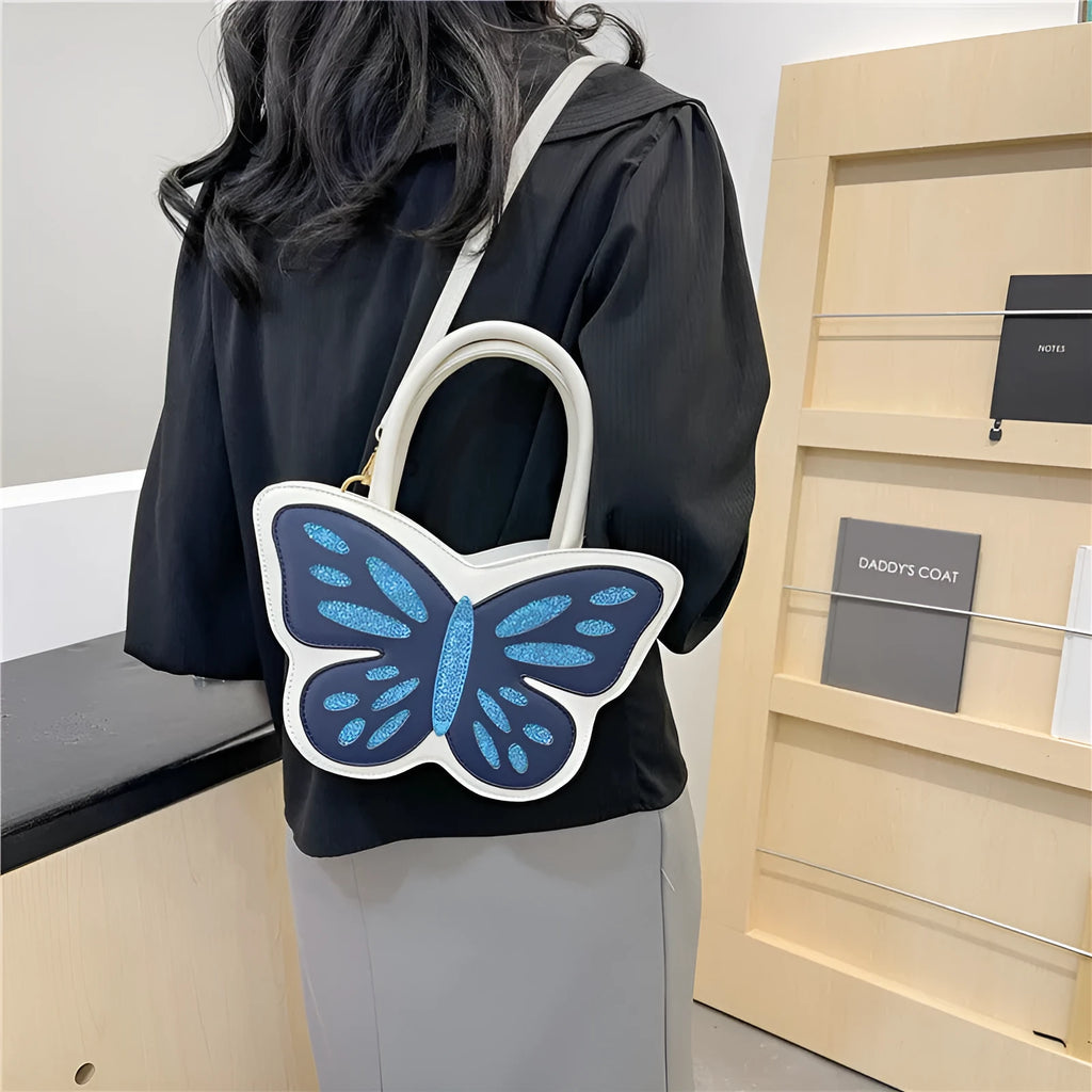 Women's square crossbody bag in PU with contrast trim showing black, blue, pink and white colour options