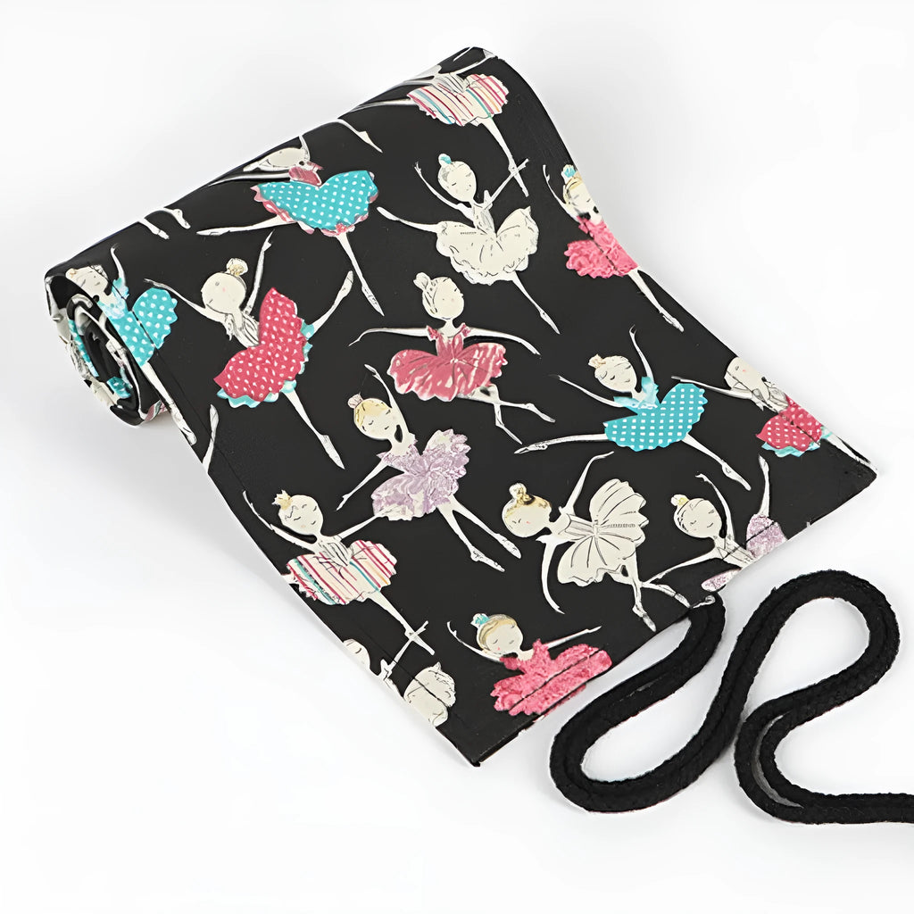 Square canvas rolling pencil case with ballet girl print, unrolled to show multiple pencil holes.