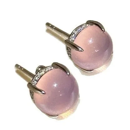 Round egg surface chalcedony stud earrings with four-claw copper setting in emerald green colour