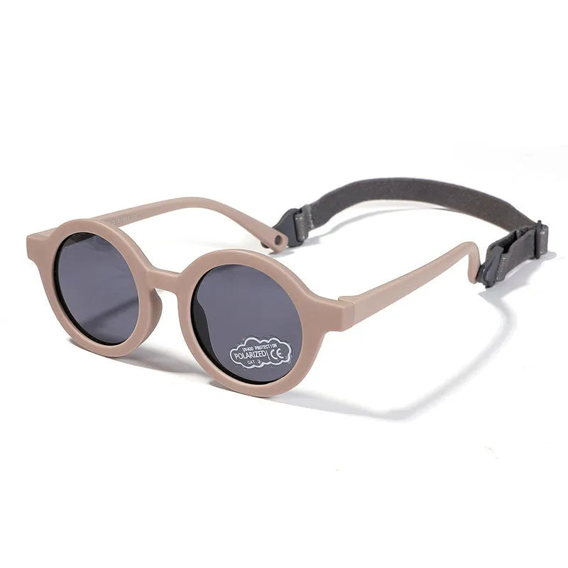 Children's silicone sunglasses with round frames and polarised lenses for 0-3 year old UV protection