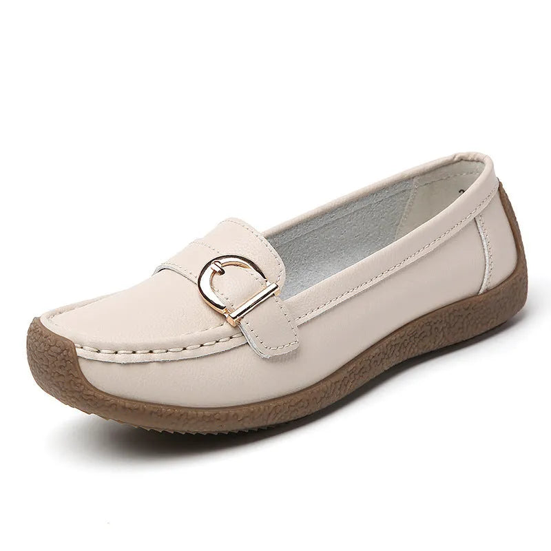 Women's beige casual slip-on loafers with a round toe and flat beef tendon sole.