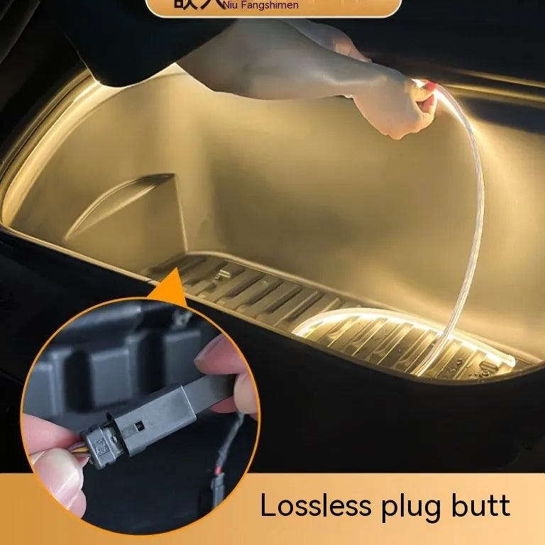 Tesla Model 3 Model Y front standby box ambient lighting kit showing soft silicone light bar