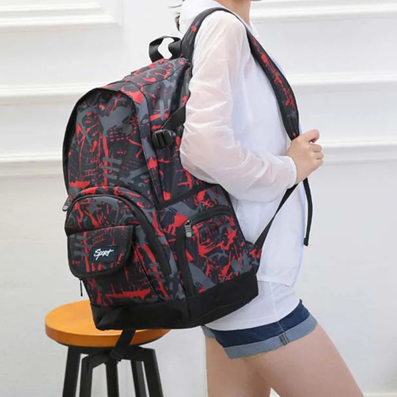 Blue and red classic nylon backpack with large main compartment for school, travel, and outdoor use