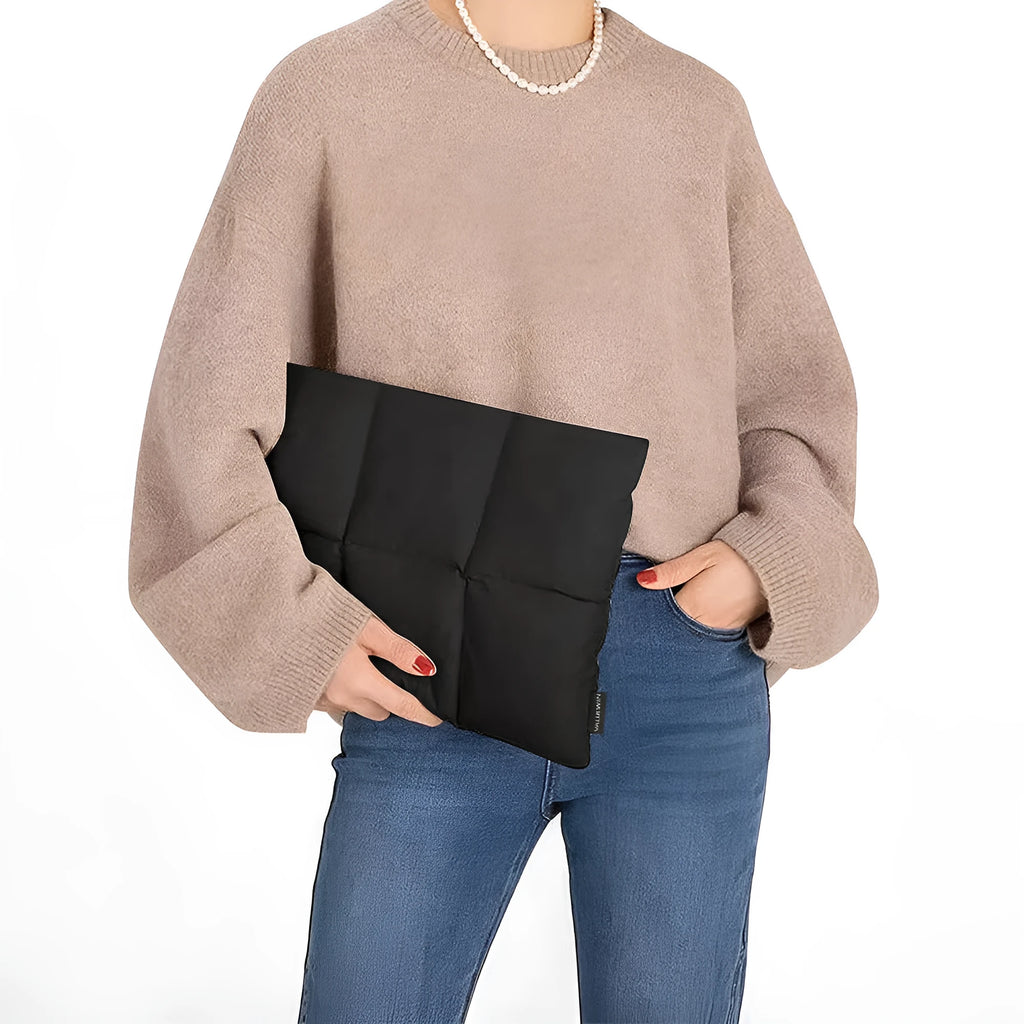 Soft fluffy laptop sleeve for 13-15.6 inch devices in black or khaki with visible sewing thread detailing